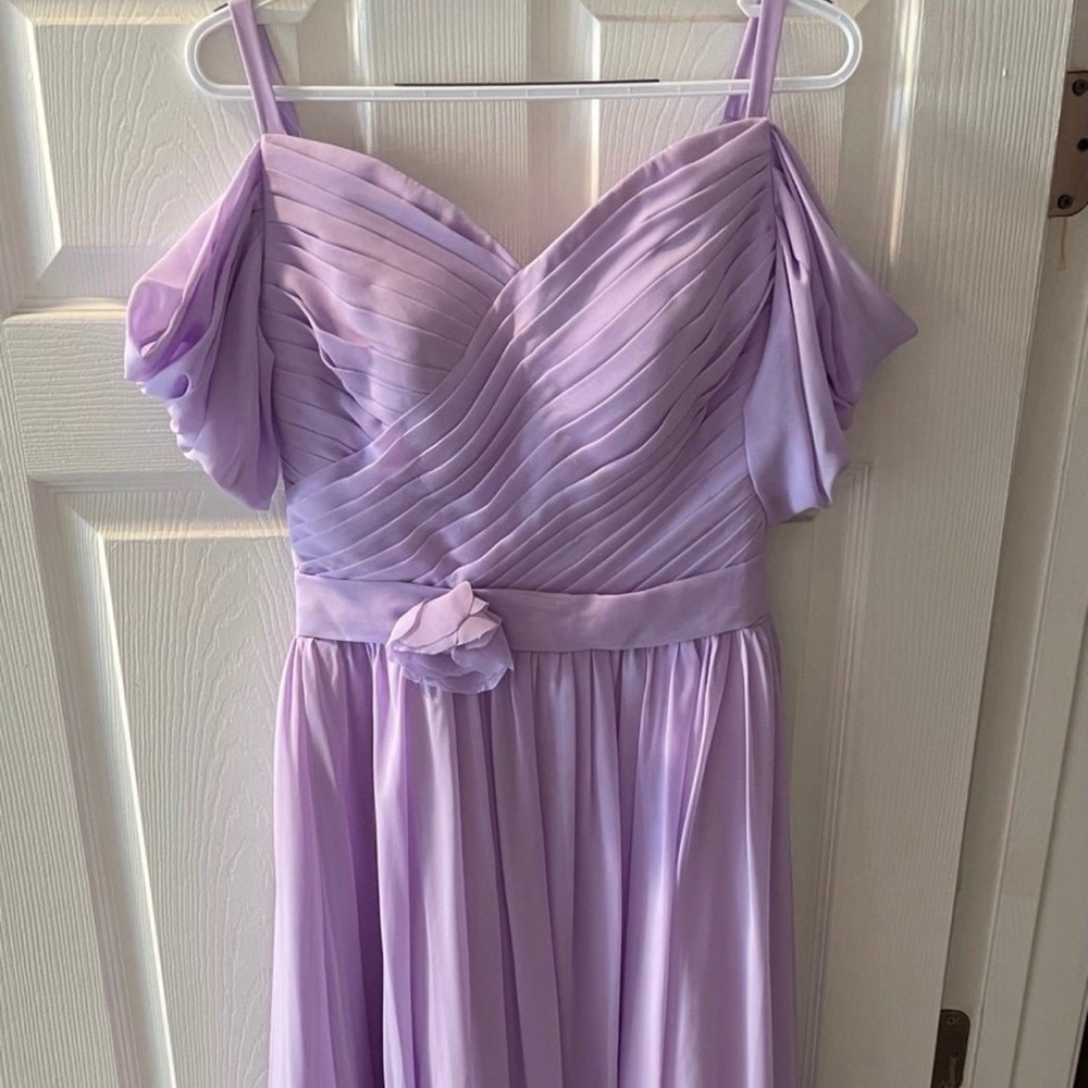 Lavender off-shoulder bridesmaid dress with flower and flowy skirt